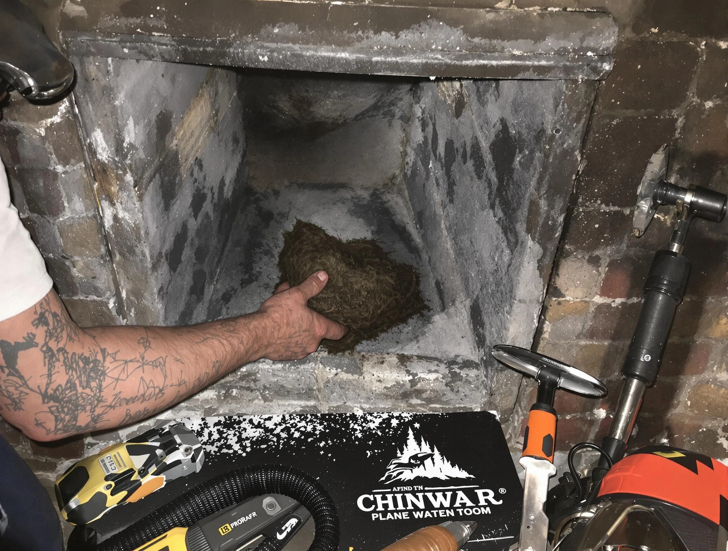 Clarkston Chimney Sweep safely removing debris and screening chimney in Clarkston, GA